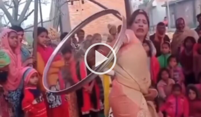 woman dance with bicycle wheel